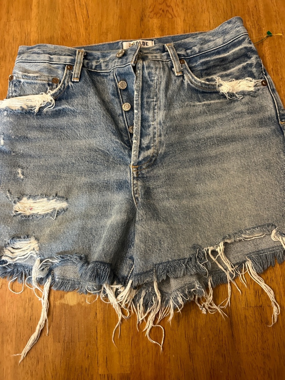 Agolde Distressed High-Waist Denim Shorts in Light Blue size 28